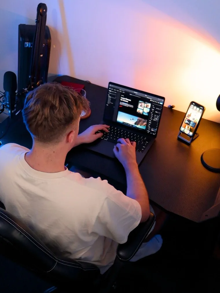 Cameron working at his desk